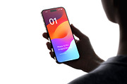 Phone 15 Pro Mockup in Hand, an iPhone Mockup by Asylab (Thumbnail 1 of 4)