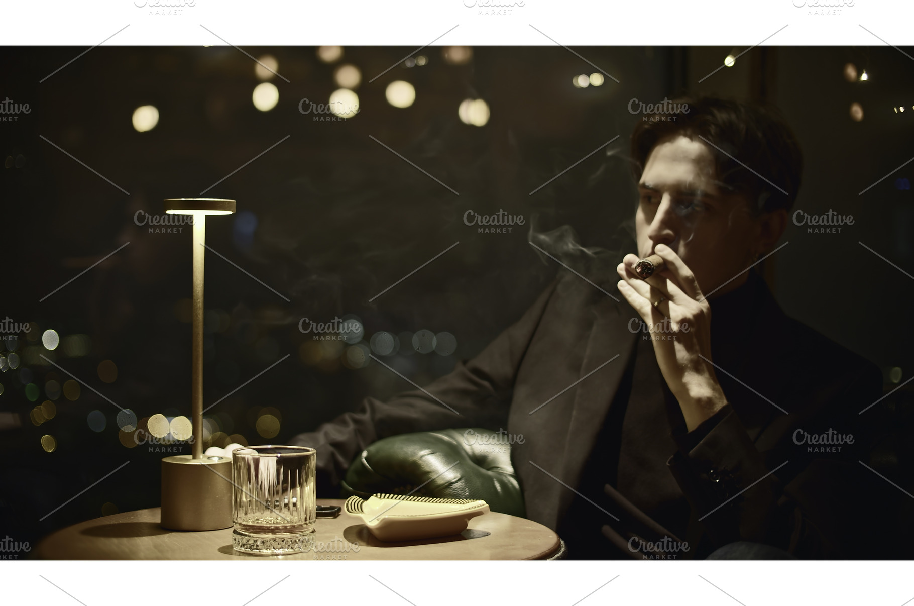 Young man elegantly smokes cigar, a Person Photo by Media Whale Stock