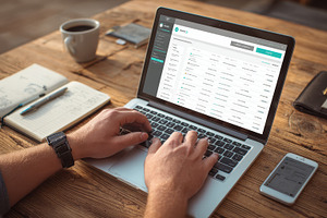 Man working on laptop online managem, a Photo by Pixeness Studio