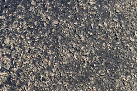 Close up of an asphalt road, a Photo by MyPhotos