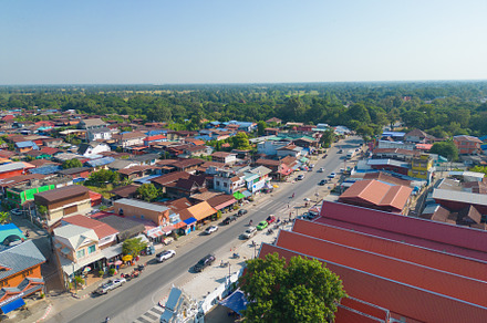 Aerial view of local residential neighborhood roofs. Urban housi