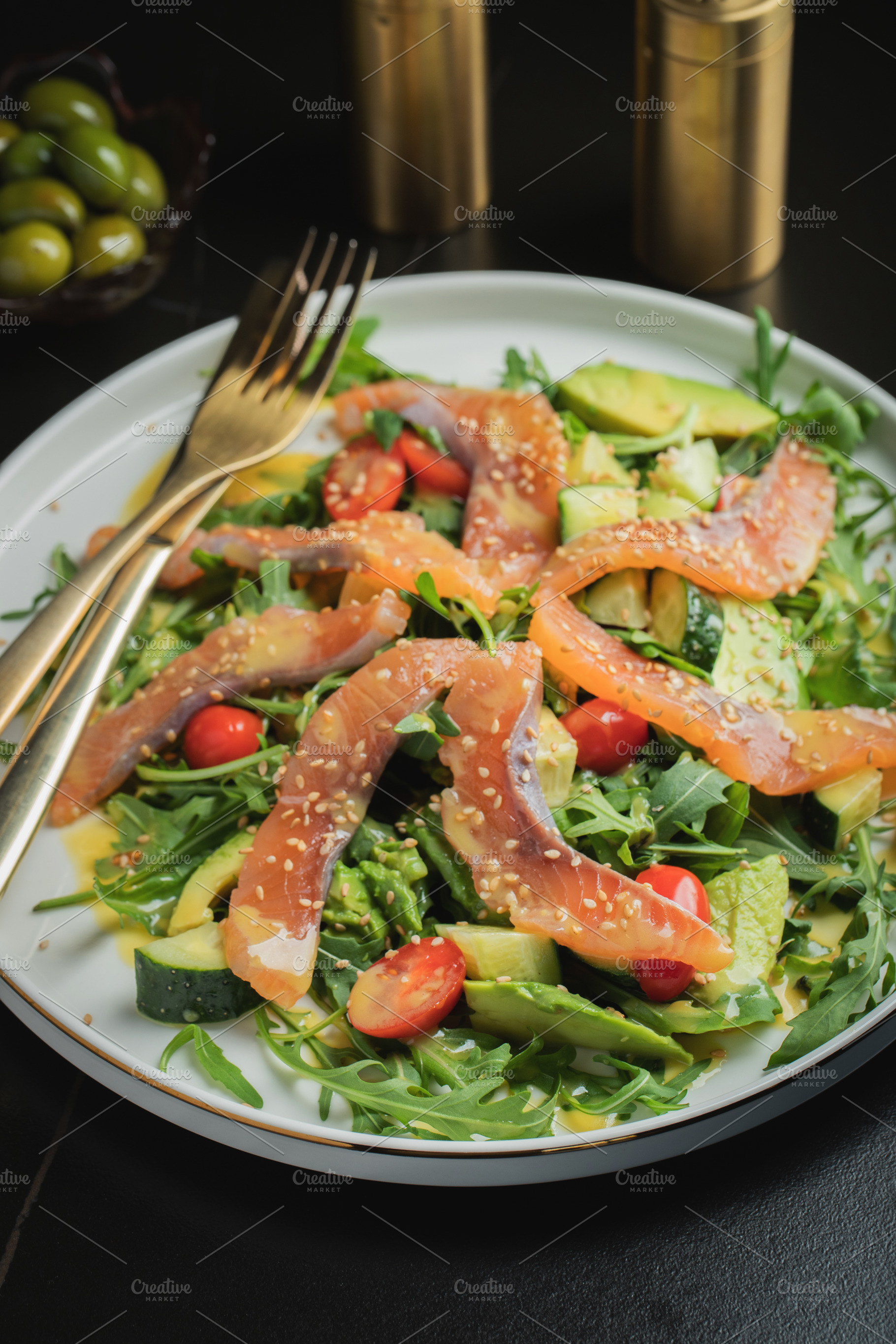 Salad with salted salmon and arugula, a Food & Drink Photo by Budarinphoto