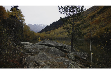 Beautiful lake in mountains with, a Person Photo by Media Whale Stock