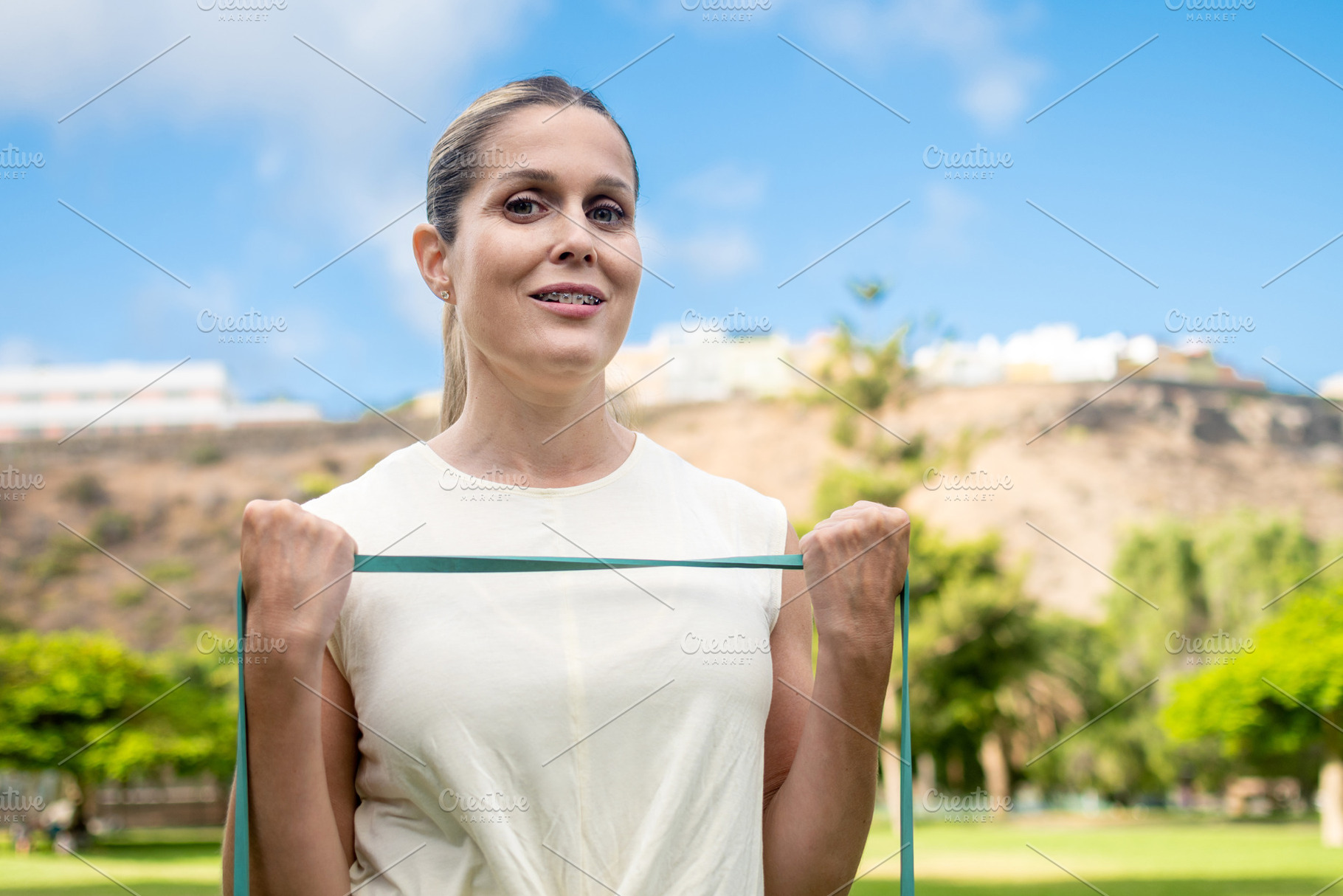 Woman training with a resistance band, a Sports & Recreation Photo by etorres69