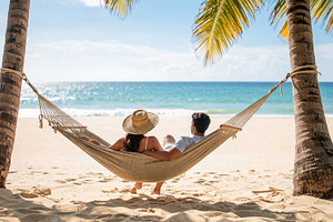 Couple Resting in Hammock by Ocean Shore, a Sports & Recreation Photo by Davizro's Market