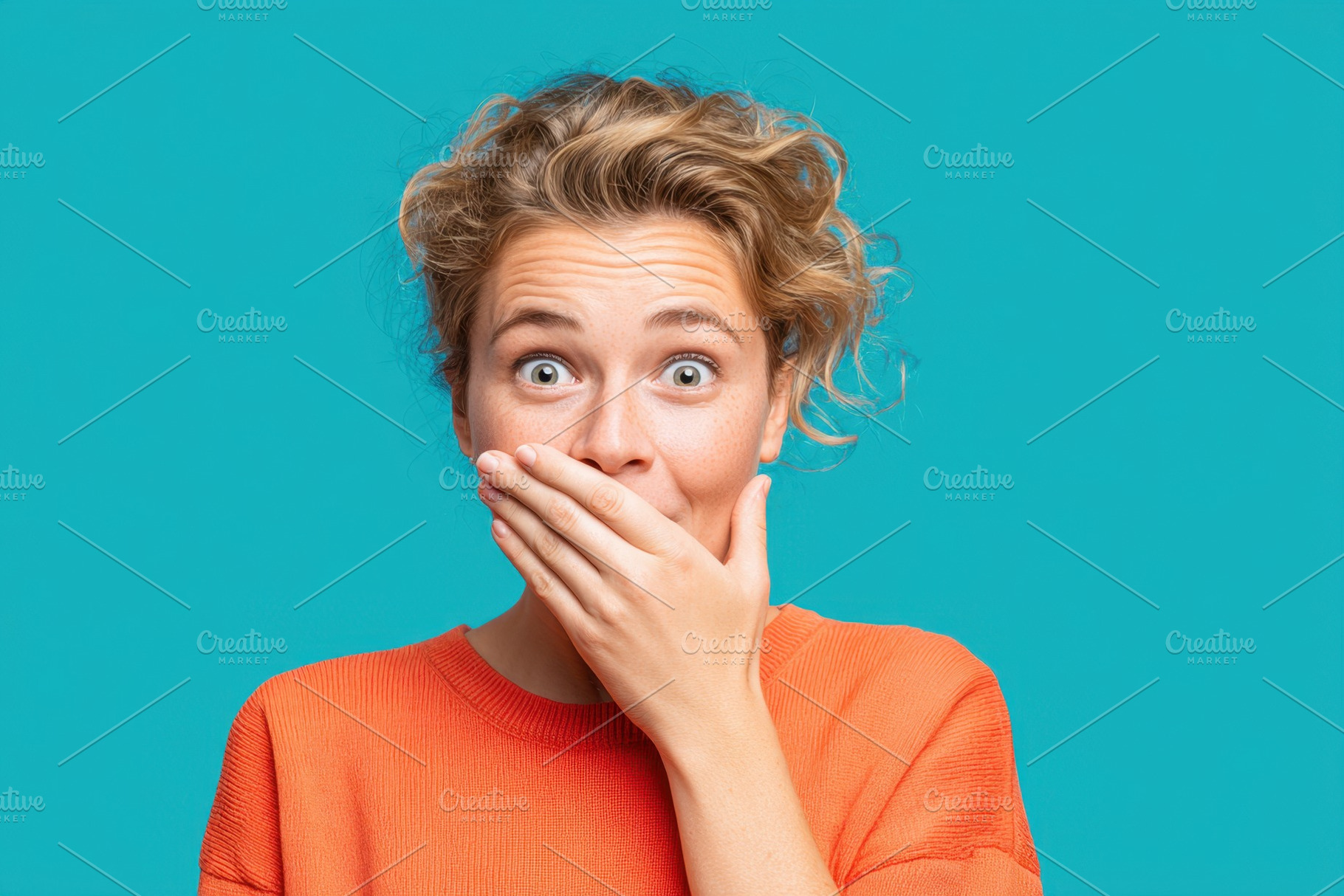 Surprised young woman covering her mouth, a Person Photo by AlyaAnd