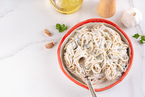 Creamy Spaghetti Pasta with high-protein Greek Yogurt Alfredo Sa, a Food & Drink Photo by Rimma