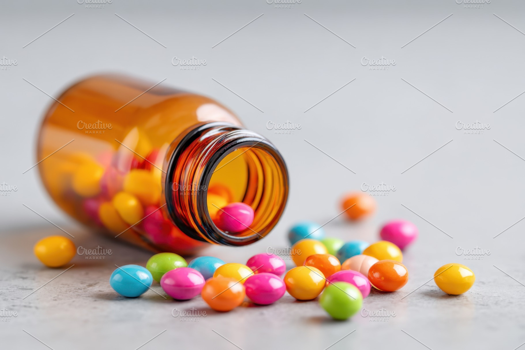 Colorful candies spilling from a glass bottle, a Health & Medical Photo by AlyaAnd