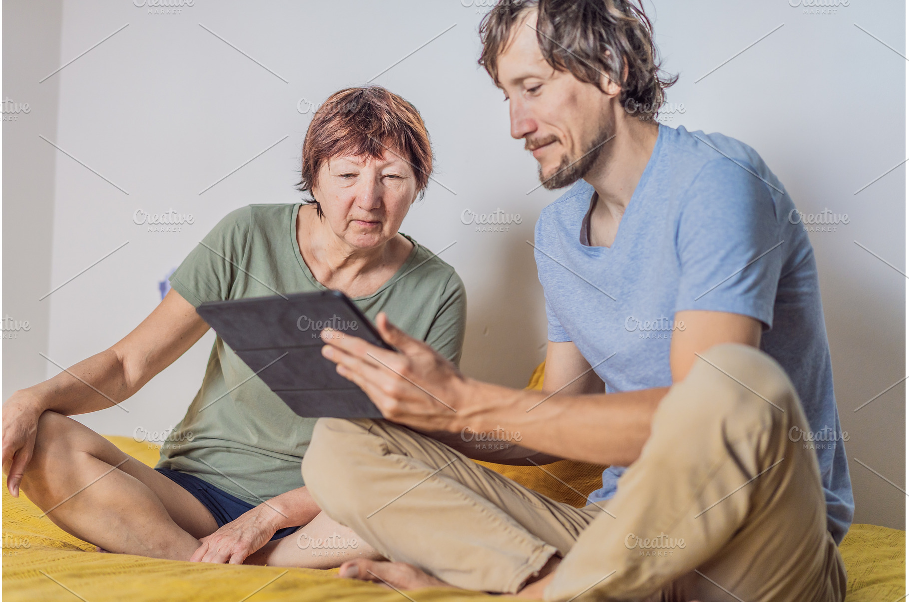 Older woman and her adult son, a Person Photo by Elizaveta Galitskaya