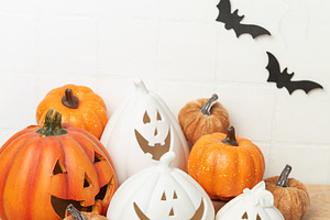 Halloween pumpkins with bats and spiders decoration