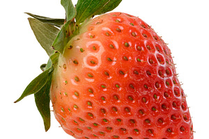 Ripe red strawberry berry with green sepals and leaves, a Food & Drink Photo by ndanko