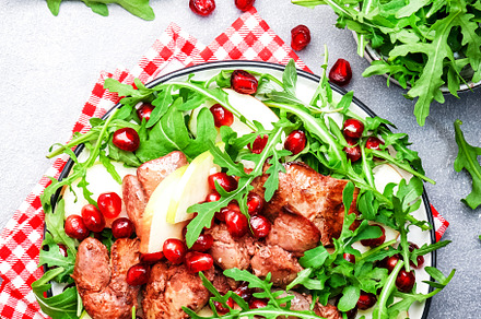 Gourmet salad with grilled chicken liver, green apple, pomegrana, a Food & Drink Photo by 5PH