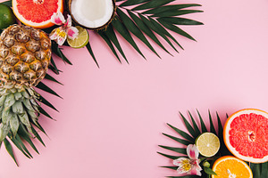 Summer fruit composition featuring summer, pineapple, and coconut