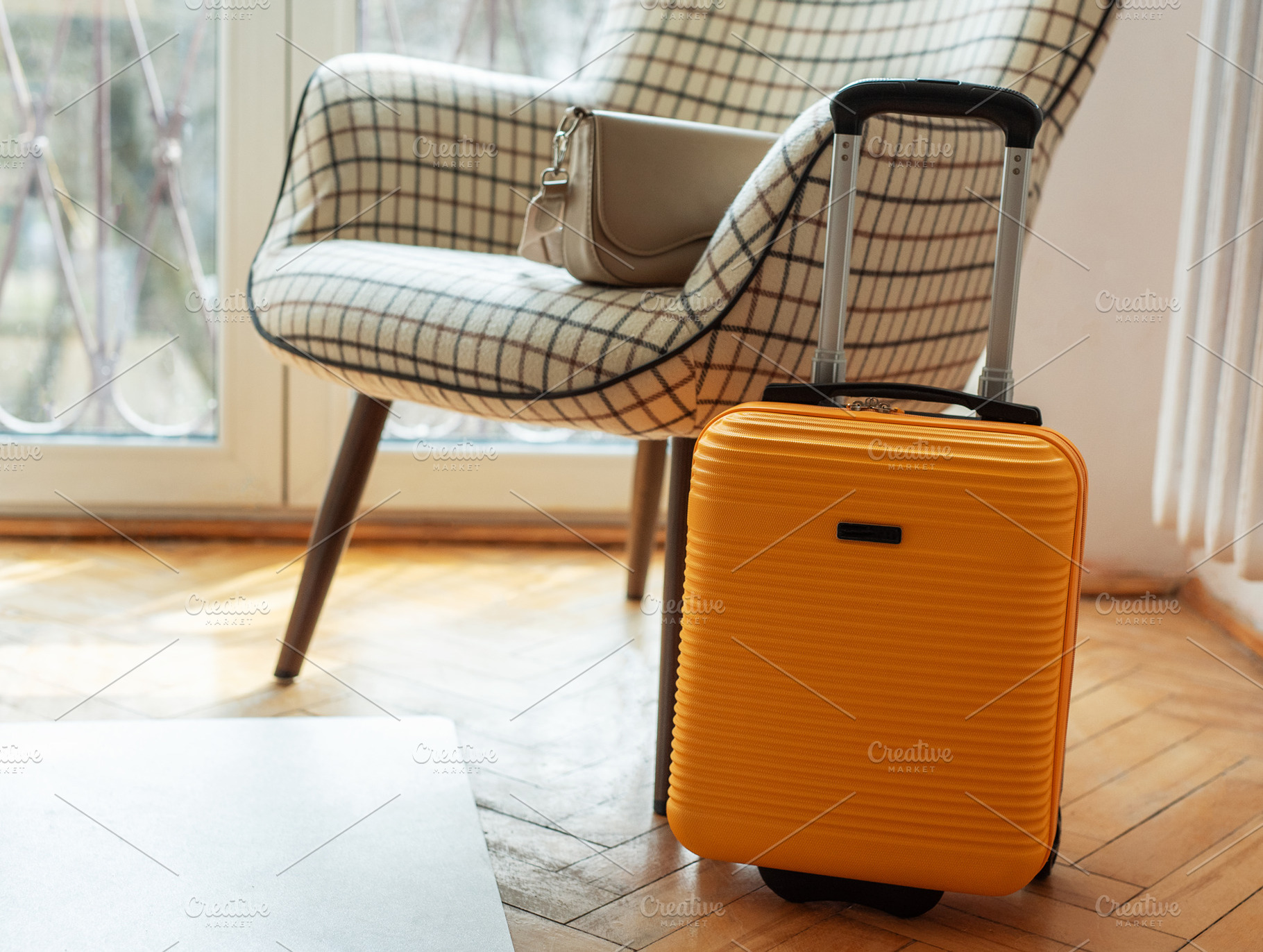 Yellow suitcase and handbag preparing for travel journey, a Holiday Photo by Olena Rudo