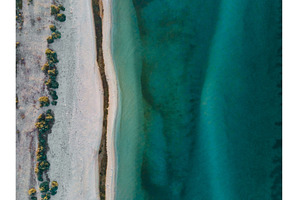 Aerial top view of sandy beach and