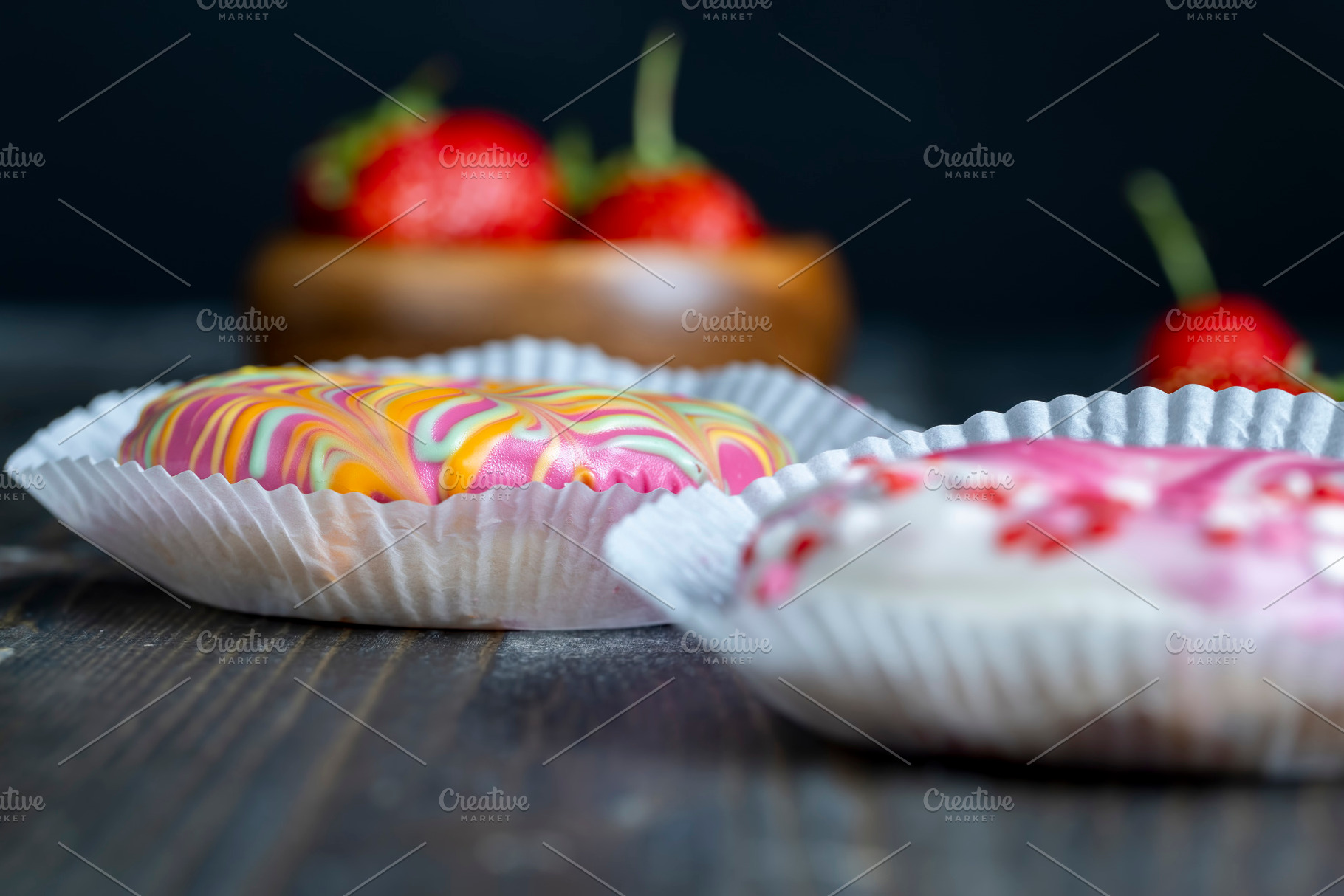 round donuts in glaze and with berry filling, a Photo by MyPhotos