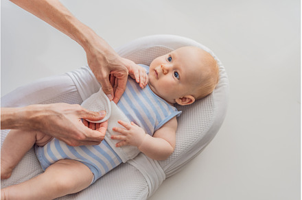 Adorable 3-month-old baby lying, a Person Photo by Elizaveta Galitskaya