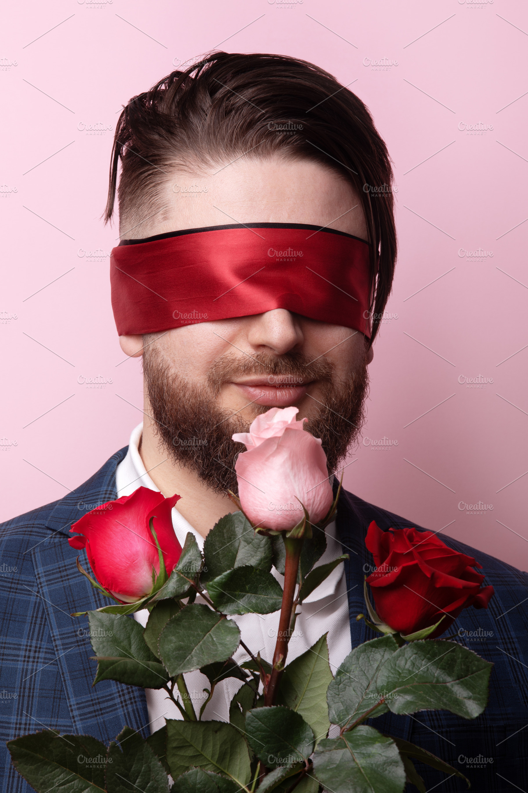 Blindfolded Man with Roses, a Person Photo by Ales Munt