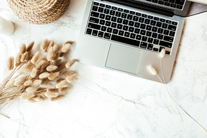 Flatlay workspace with laptop, a Business Photo by Floral Deco