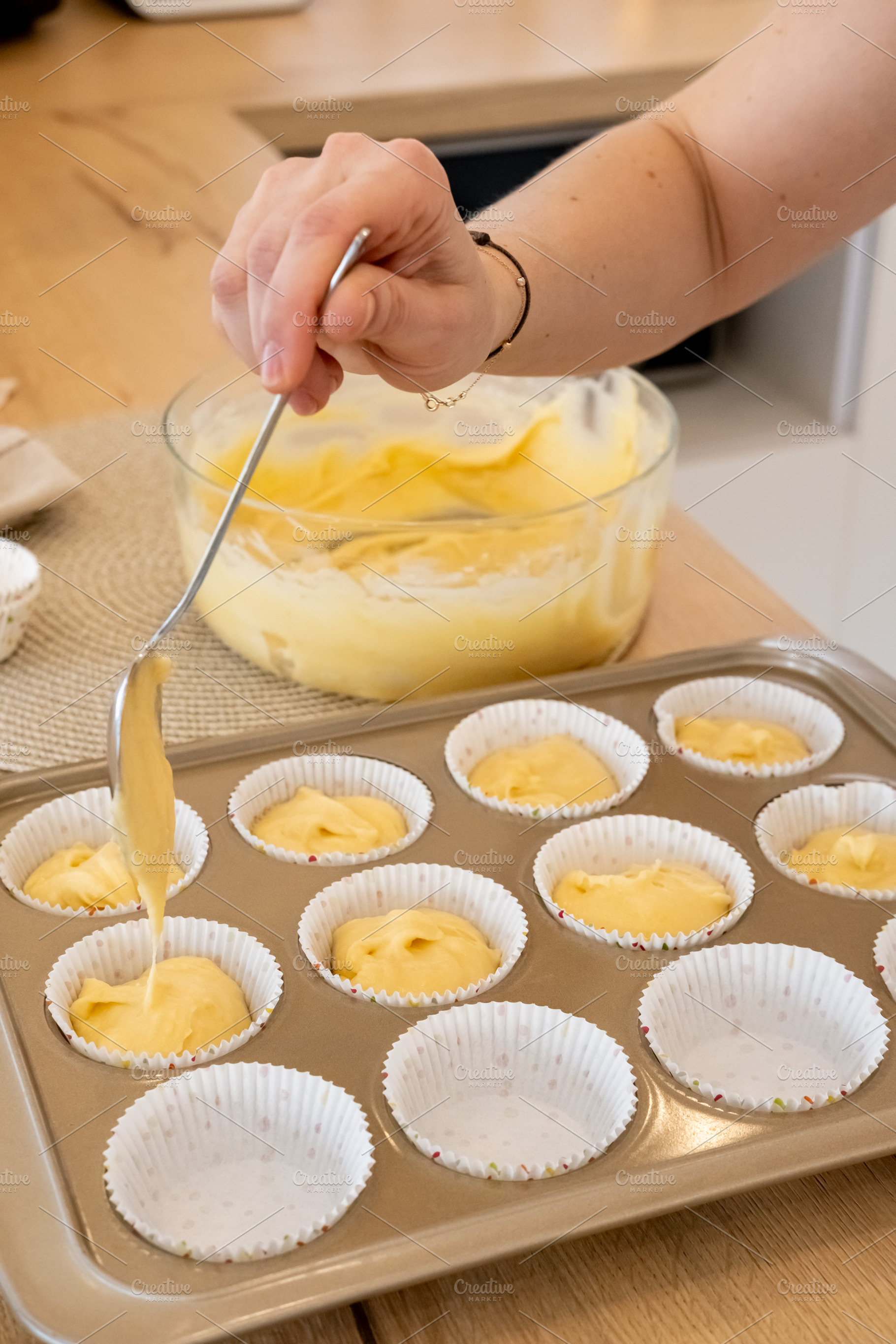 Cupcake cooking treat baking dough paper liners, a Person Photo by Photo Drive Studio