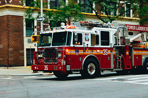 NYC Firetruck Driving on a Road