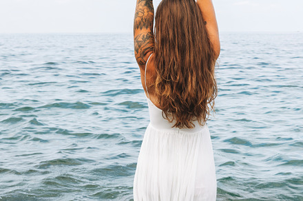 Young woman in white dress on sea, a Person Photo by Galina_Zhigalova