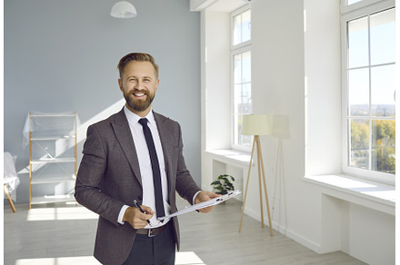 Smiling confident male realtor, a Person Photo by StudioRomantic