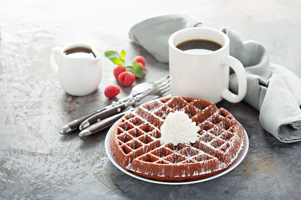 Red velvet waffles with whipped crea, a Background Photo by farwasser