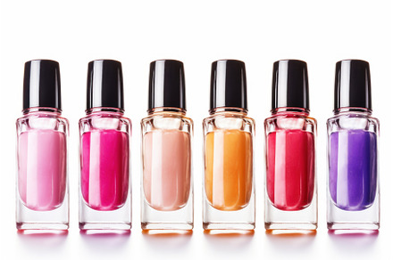Open bottle with bright nail polish, a Beauty & Fashion Photo by Ylivdesign