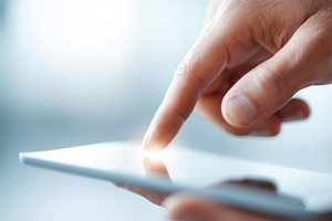 Close up of a hand using touchscreen, a Technology Photo by MistyDay