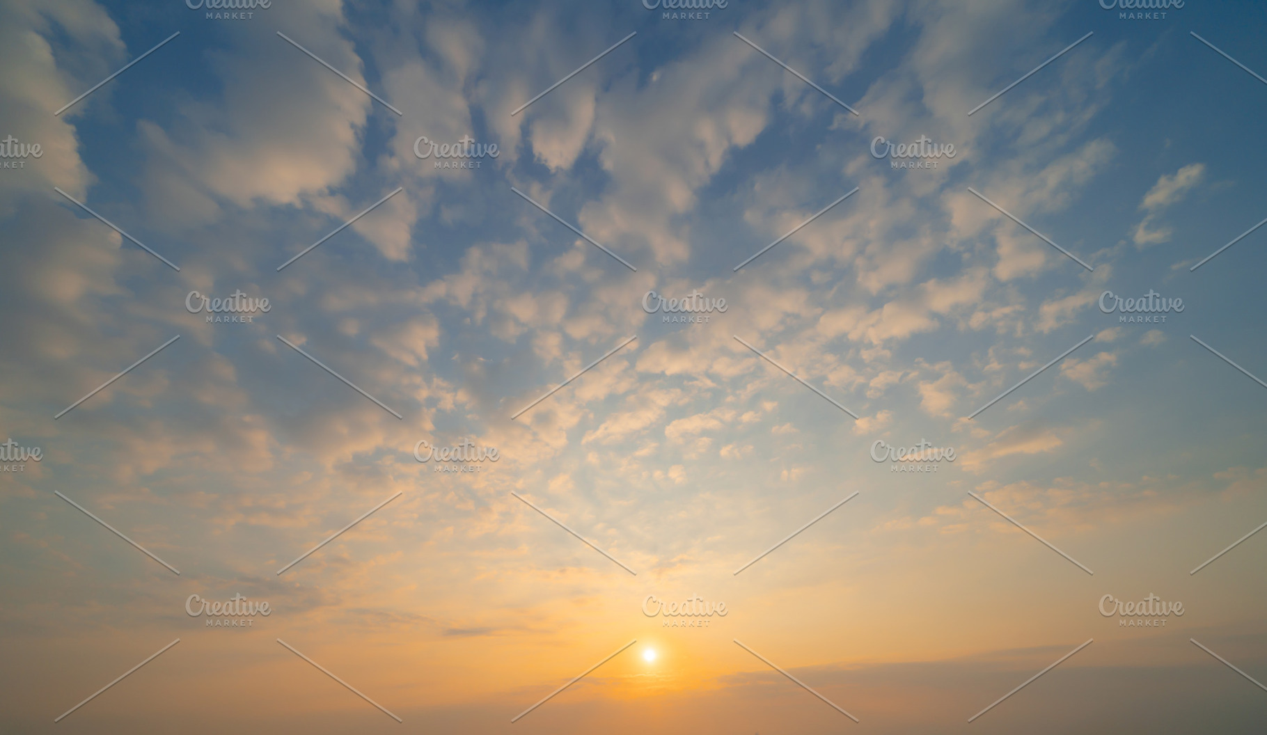 Sunset sky. Abstract nature background. Dramatic blue with orang, a Background Photo by Tampatra