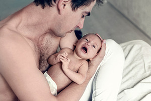 the father holds a newborn son, a Person Photo by Eni_fly