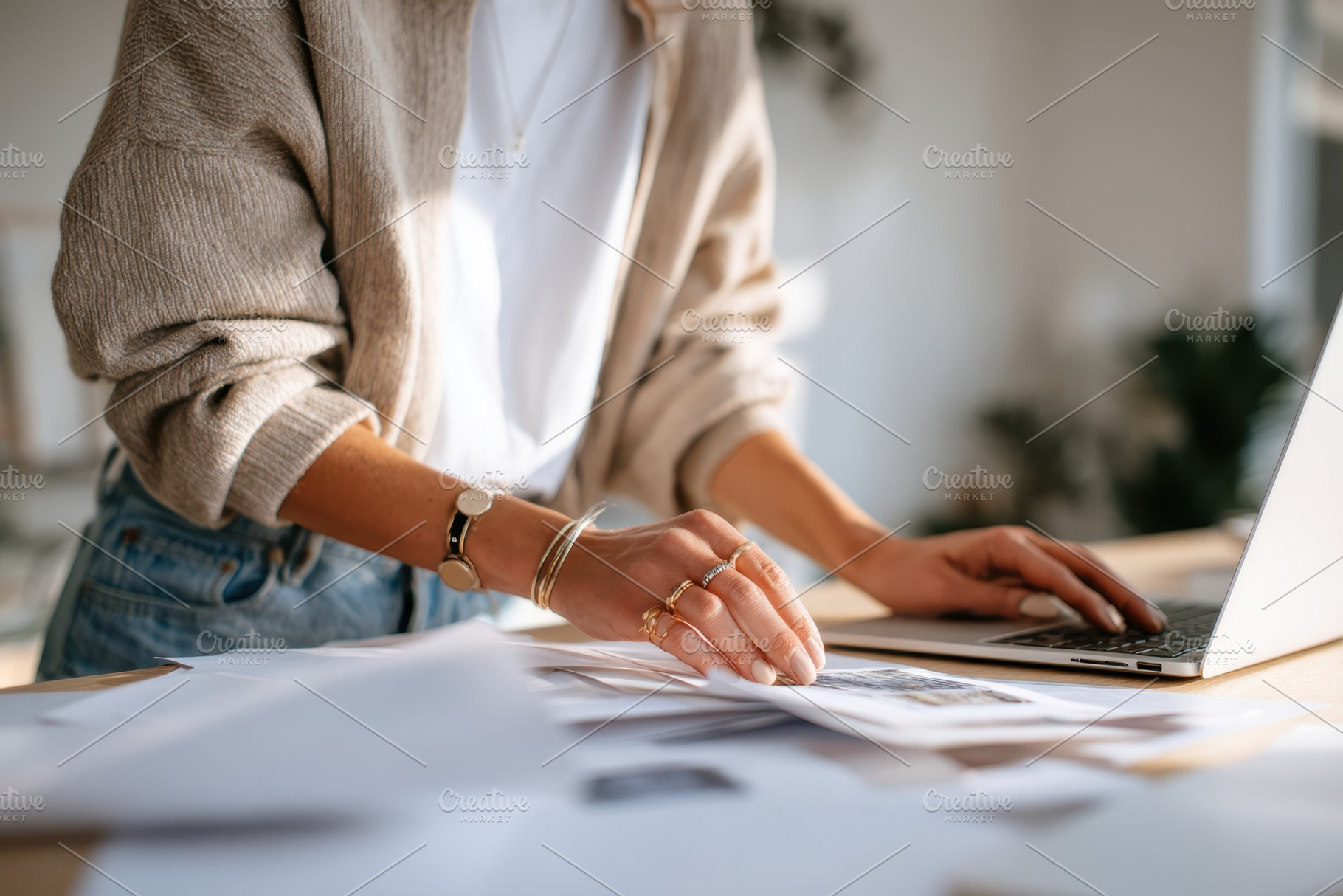 Person working on laptop in modern workspace, a Business Photo by AlyaAnd