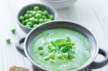 Fresh vegetable soup made of green peas, a Food & Drink Photo by Olena Rudo
