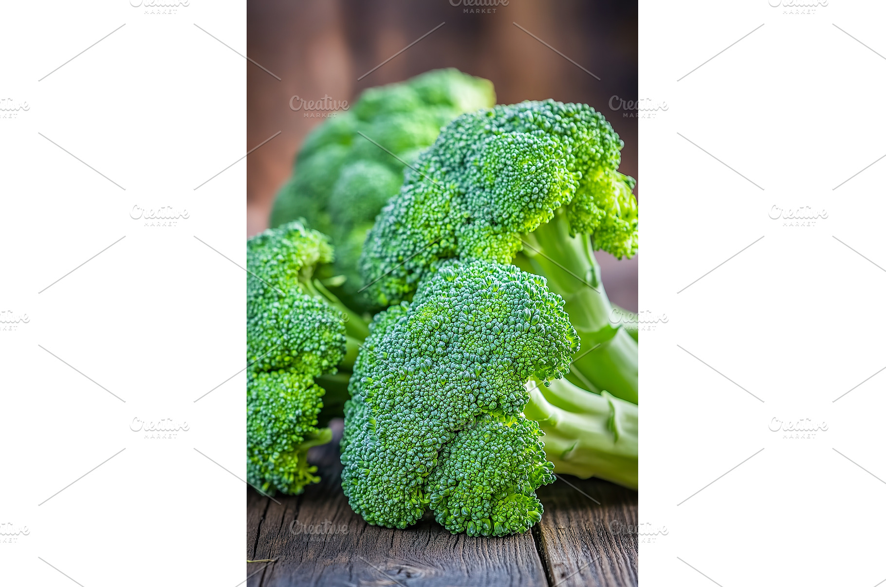 Fresh green broccoli on wooden, a Food & Drink Photo by Lermont51