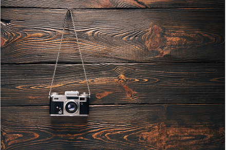 Vintage old camera hang on nail over, an Arts & Entertainment Photo by Gladkov photography