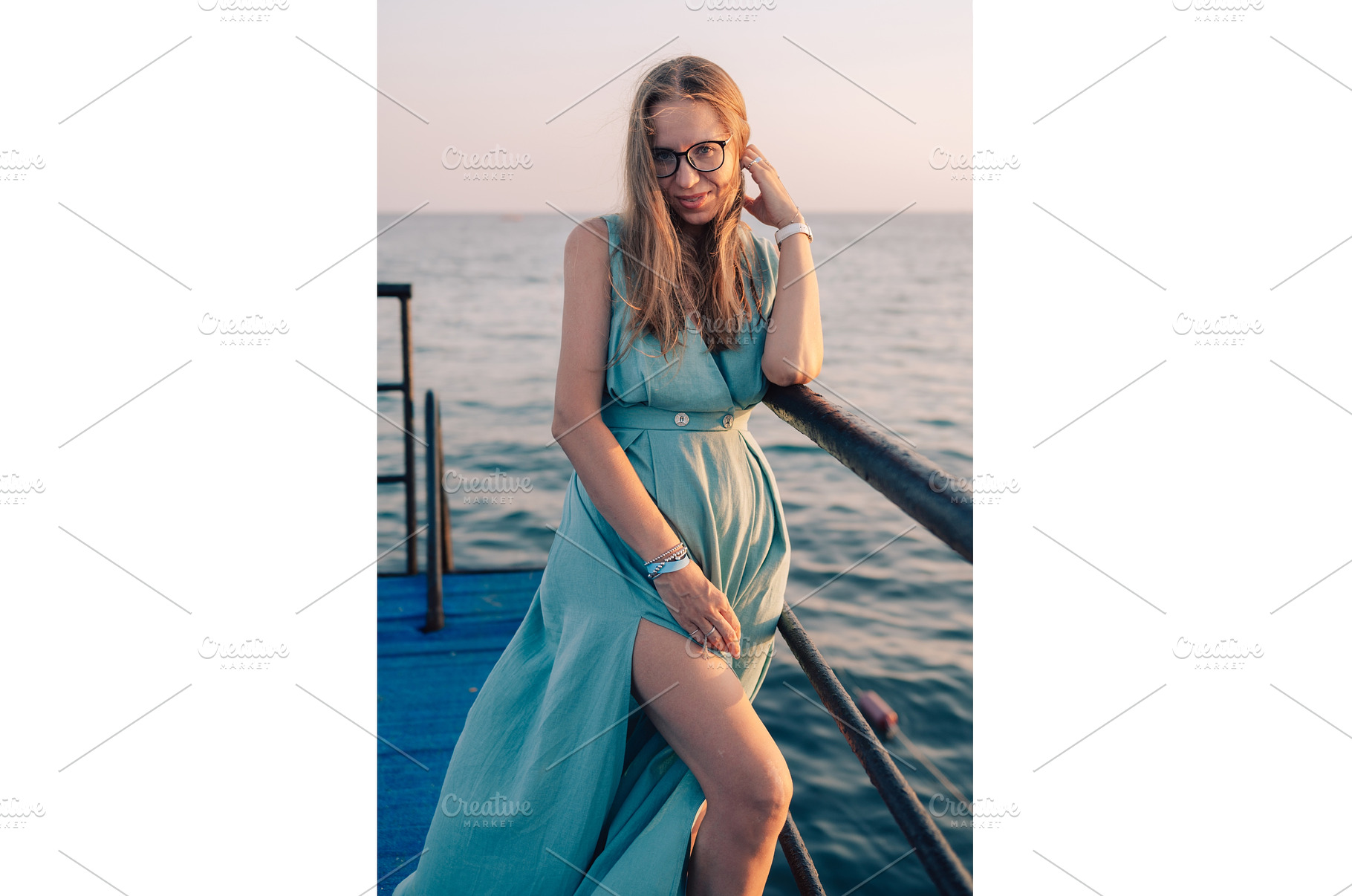 Woman in Flowing Dress on Seaside, a Person Photo by Jan Jack Russo Media