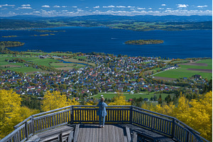At an observation point in Carinthia, a Person Photo by ZinetroN