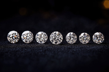 A row of sparkling diamonds of various sizes displayed on a dark background, sh, an Arts & Entertainment Photo by Textures & Backgrounds