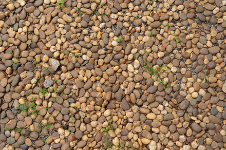Granite gravel stone rocks flooring pattern surface texture. Clo, a Background Photo by Tampatra