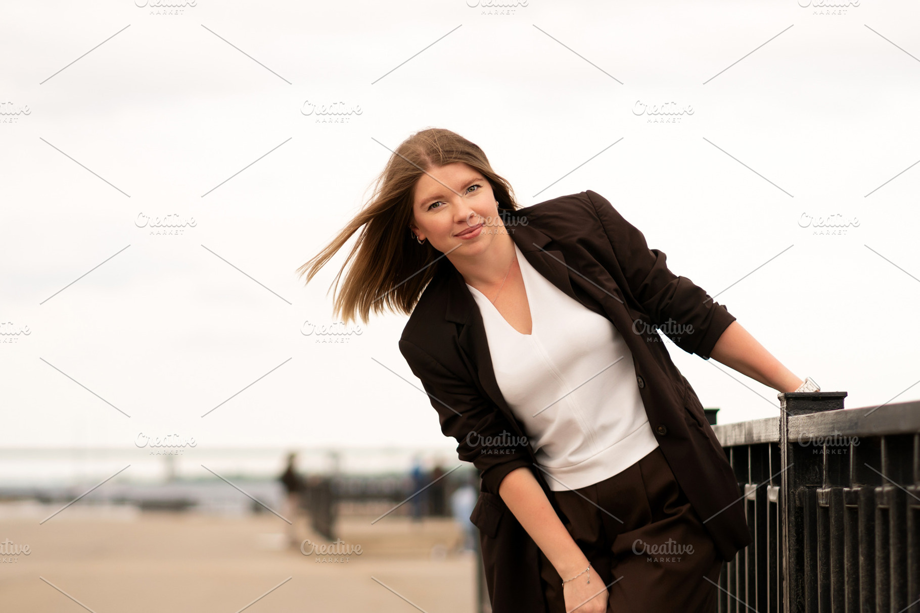 Young woman in brown suit posing, a Person Photo by Elena Vagengeim