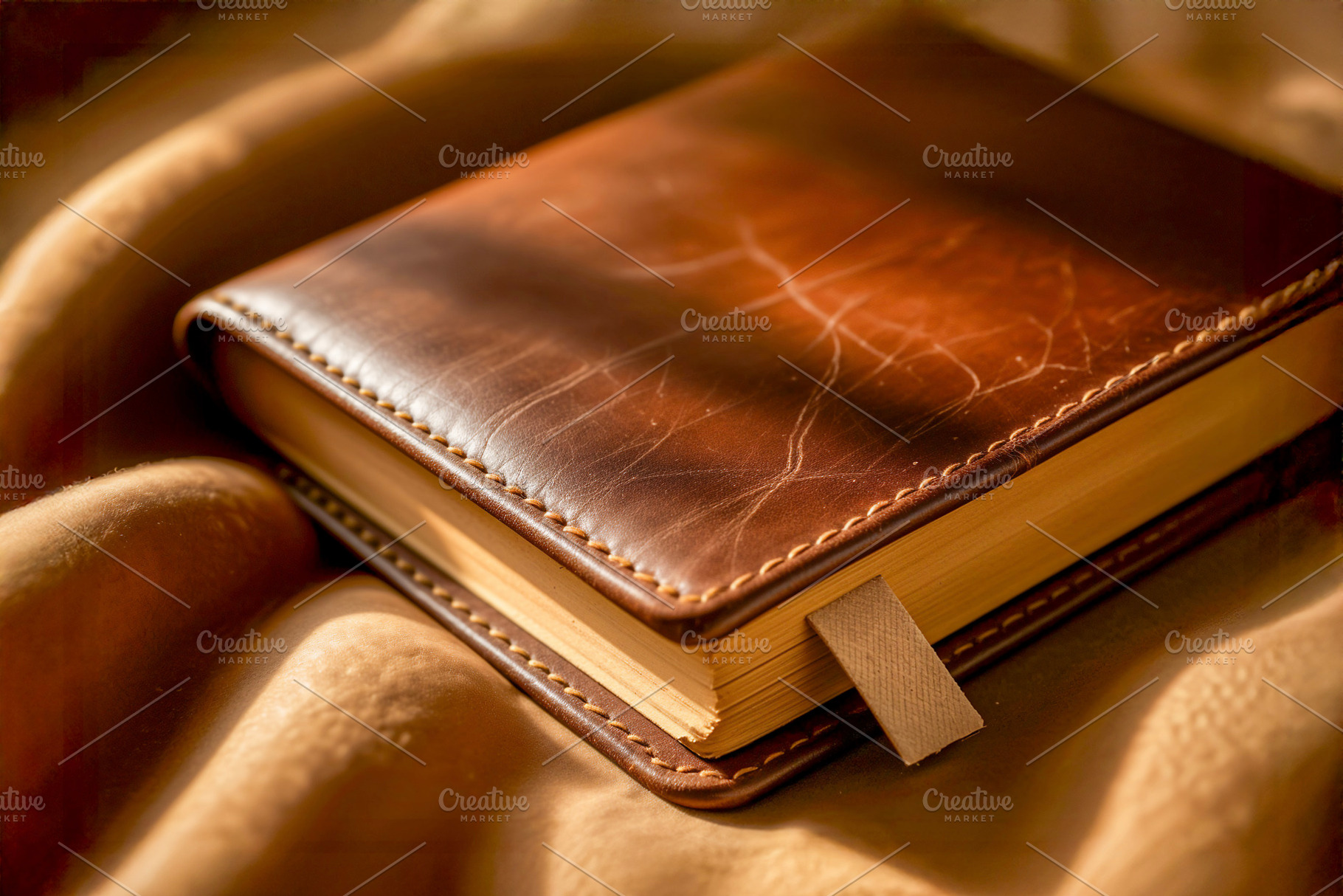 Old leather journal for writing, a Photo by rarrarorro