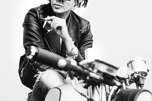 Biker woman in leather jacket on motorcycle containing girl, recast, and, a Person Photo by Aliaksei Kaponia