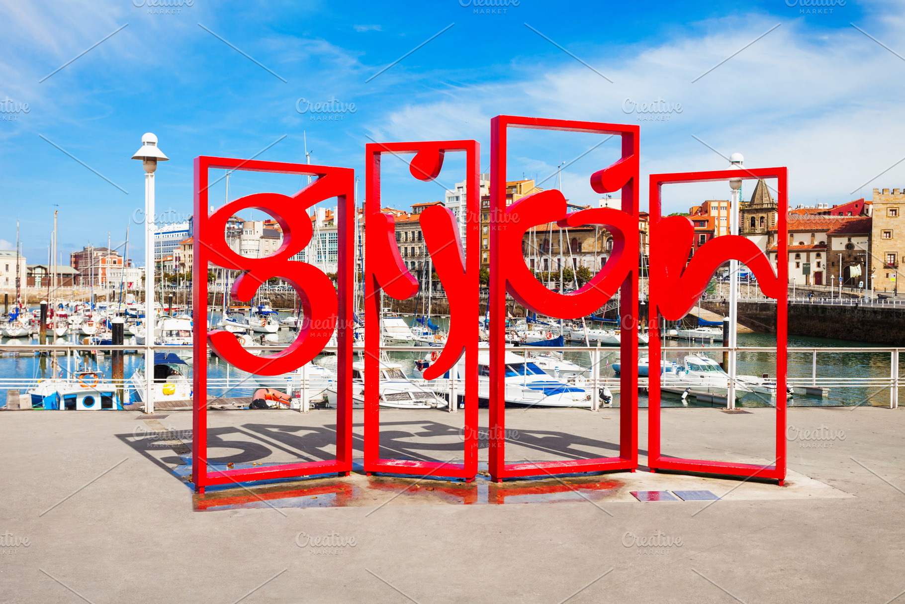 Gijon symbol red monument in the centre of Gijon city in Asturia, a Photo by saiko3p
