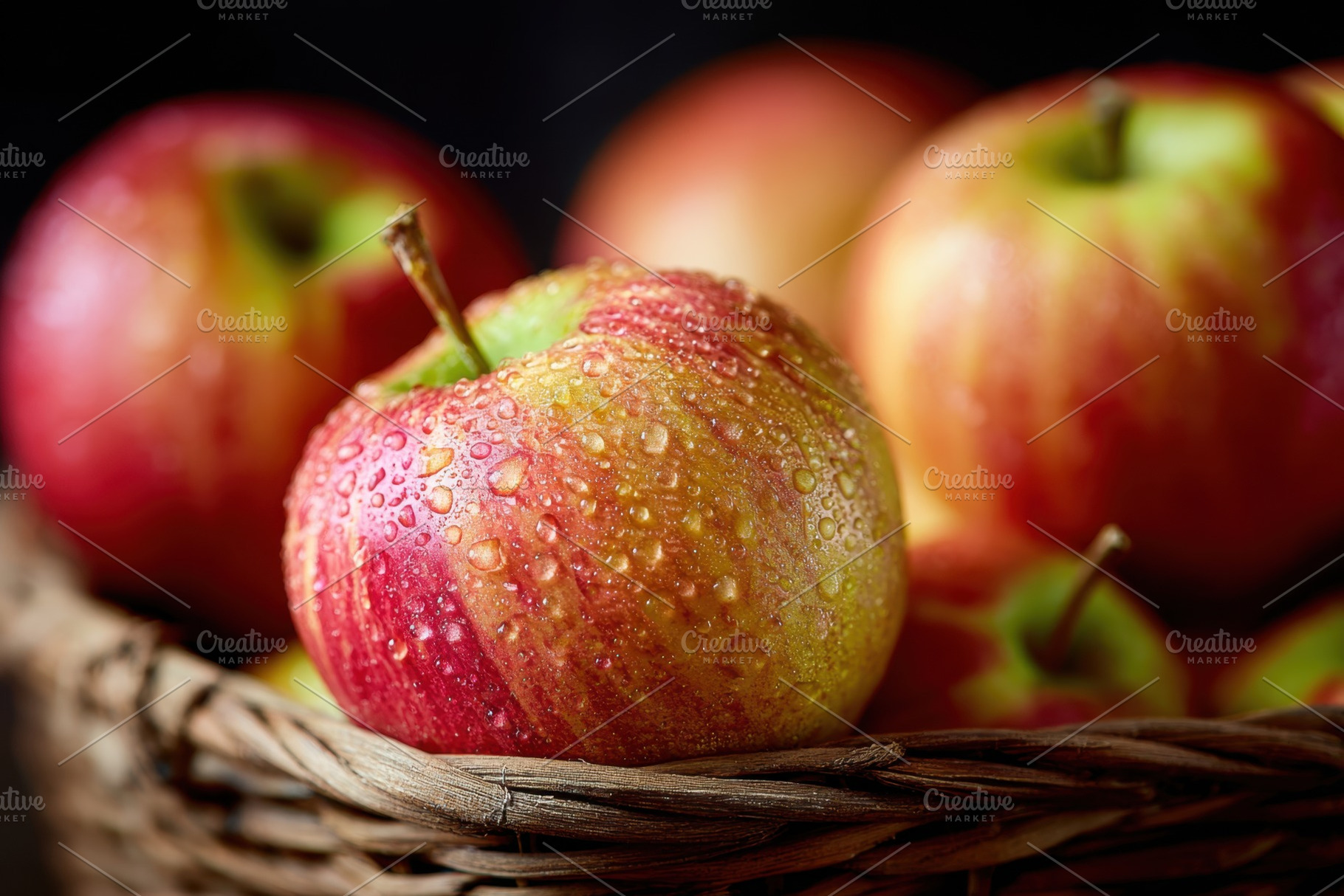 Fresh ripe apples in basket, a Food & Drink Photo by AlyaAnd