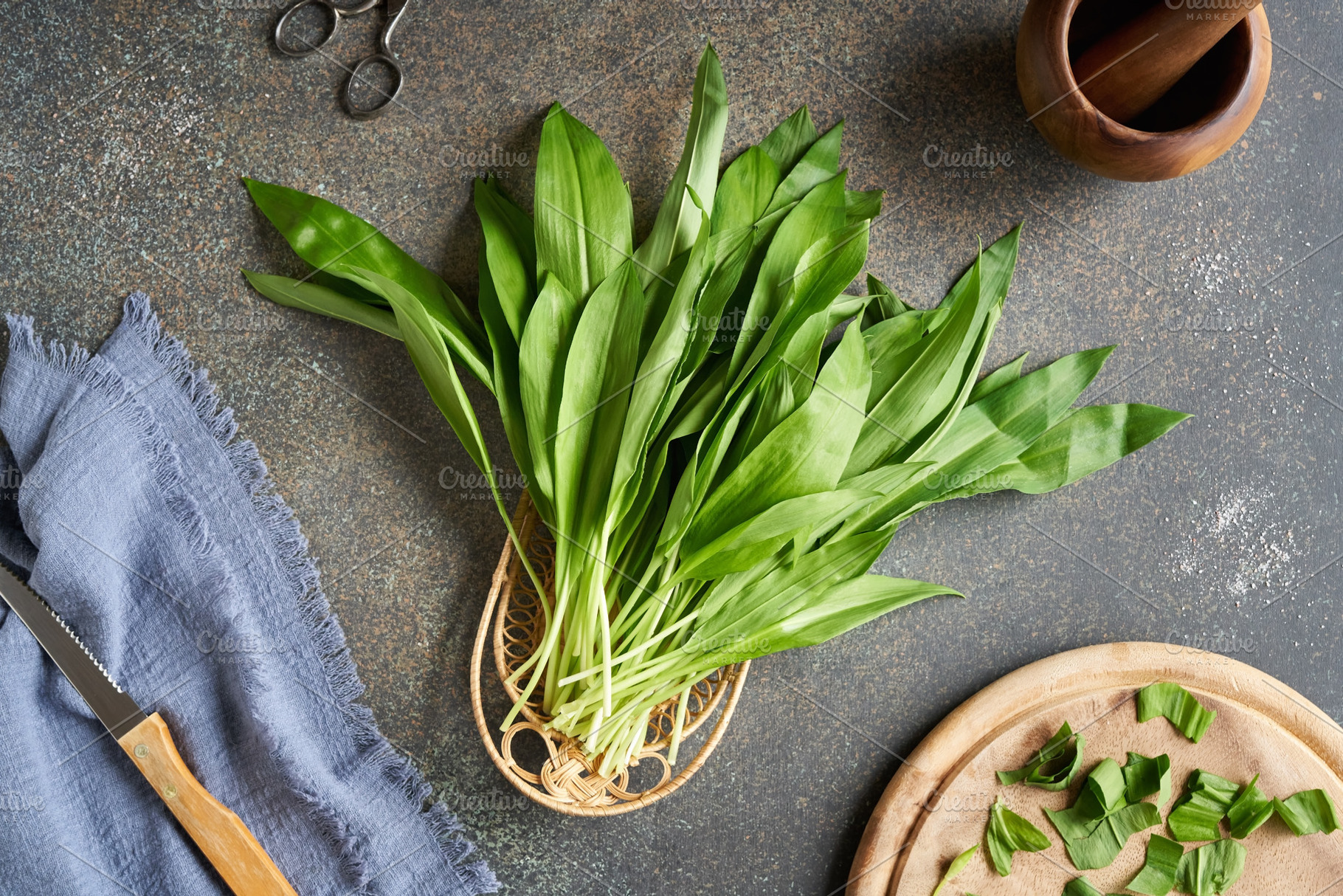 Fresh wild garlic leaves on a dark background, a Food & Drink Photo by Madeleine Steinbach