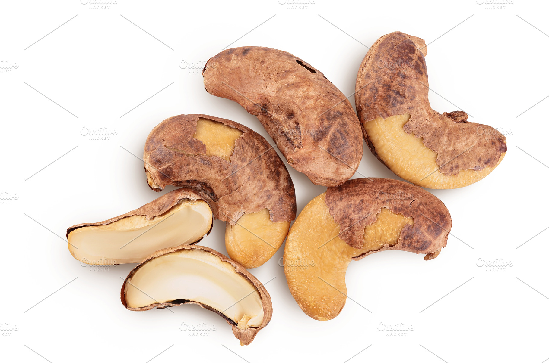 cashew nuts heap with shell isolated, a Food & Drink Photo by NataPhoto
