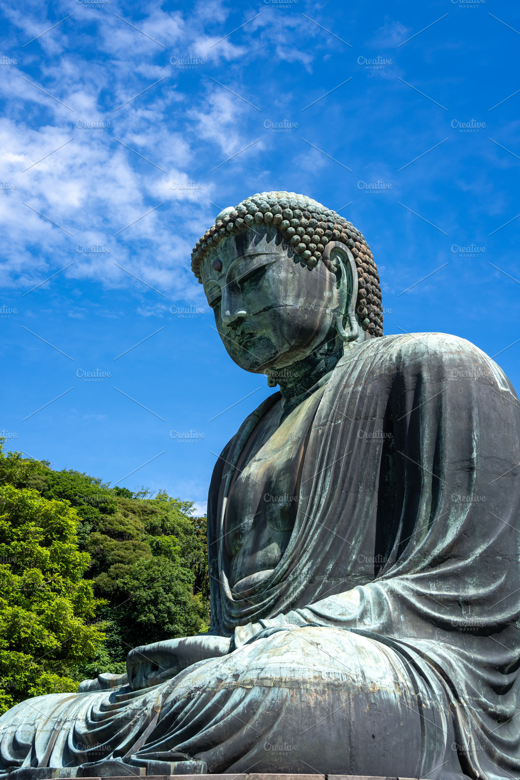 Great Buddha statue close-up view at Kotoku-in temple in Kamakur, an Architecture Photo by GoodGoods