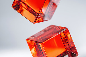 Glossy red cubes suspended in mid-air create a striking visual effect, a Sports & Recreation Photo by AlyaAnd
