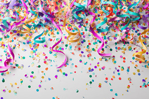 Festive confetti and ribbons celebra, a Photo by Pixeness Studio